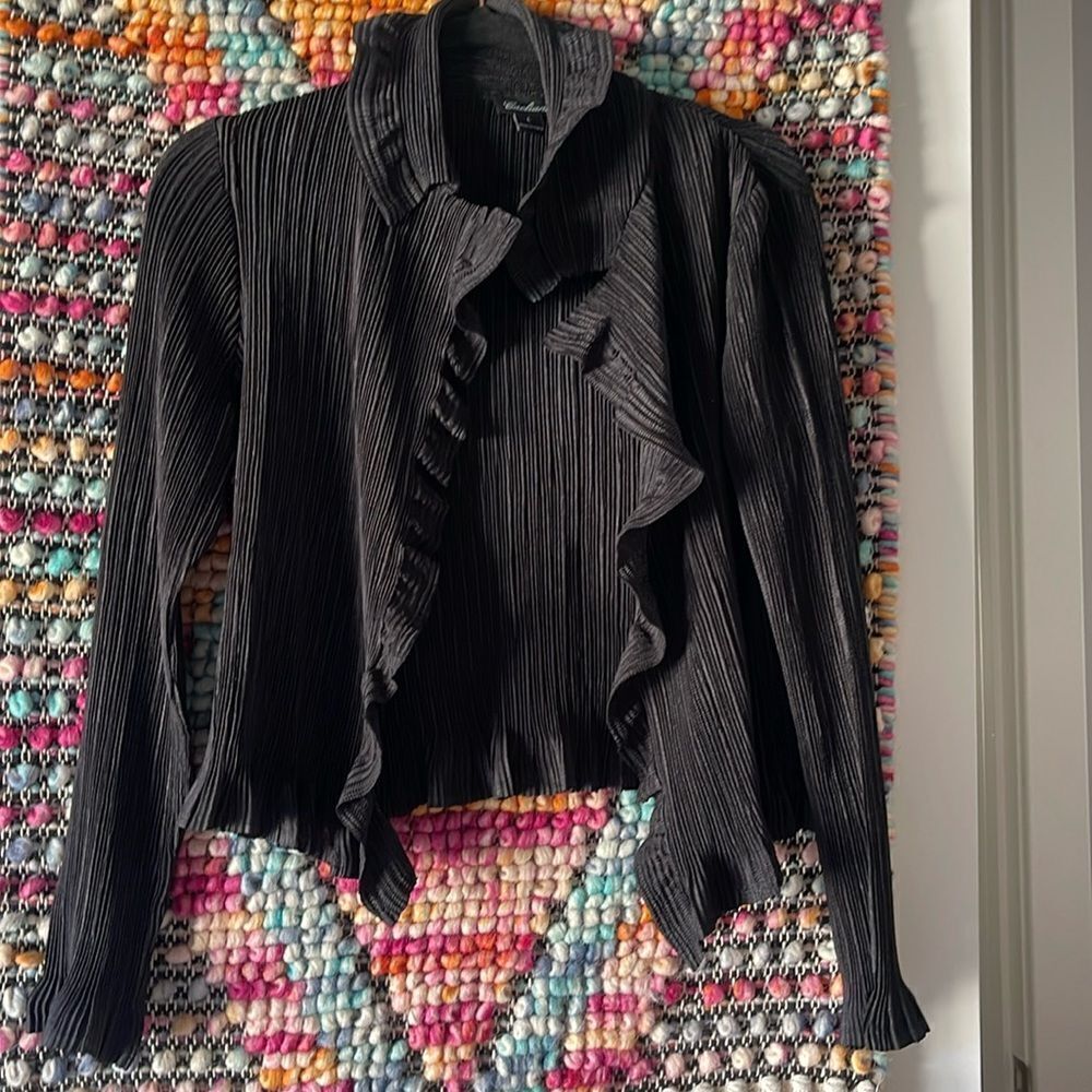 Great little black jacket for the holidays. Throw over a dress and you’re ready
